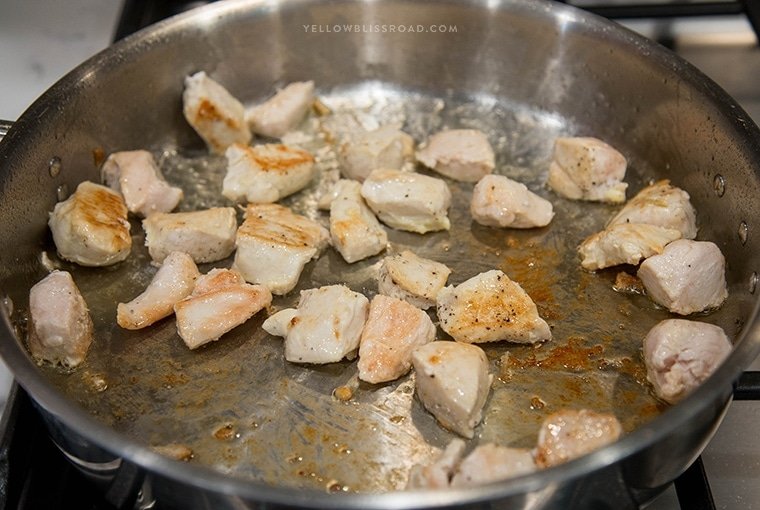 One Pan Creamy Lemon Chicken Picatta Pasta - Tender chicken and pasta are coated with a luscious lemony cream sauce with capers. Easy weeknight dinner that's classy enough for company.