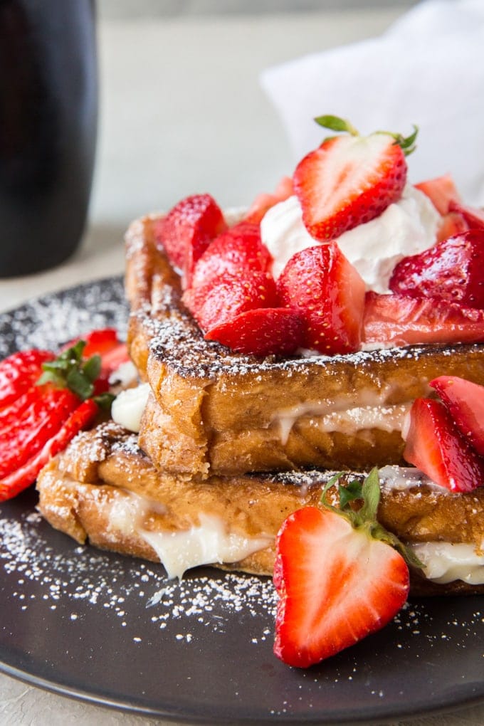 french toast with powdered sugar and syrup