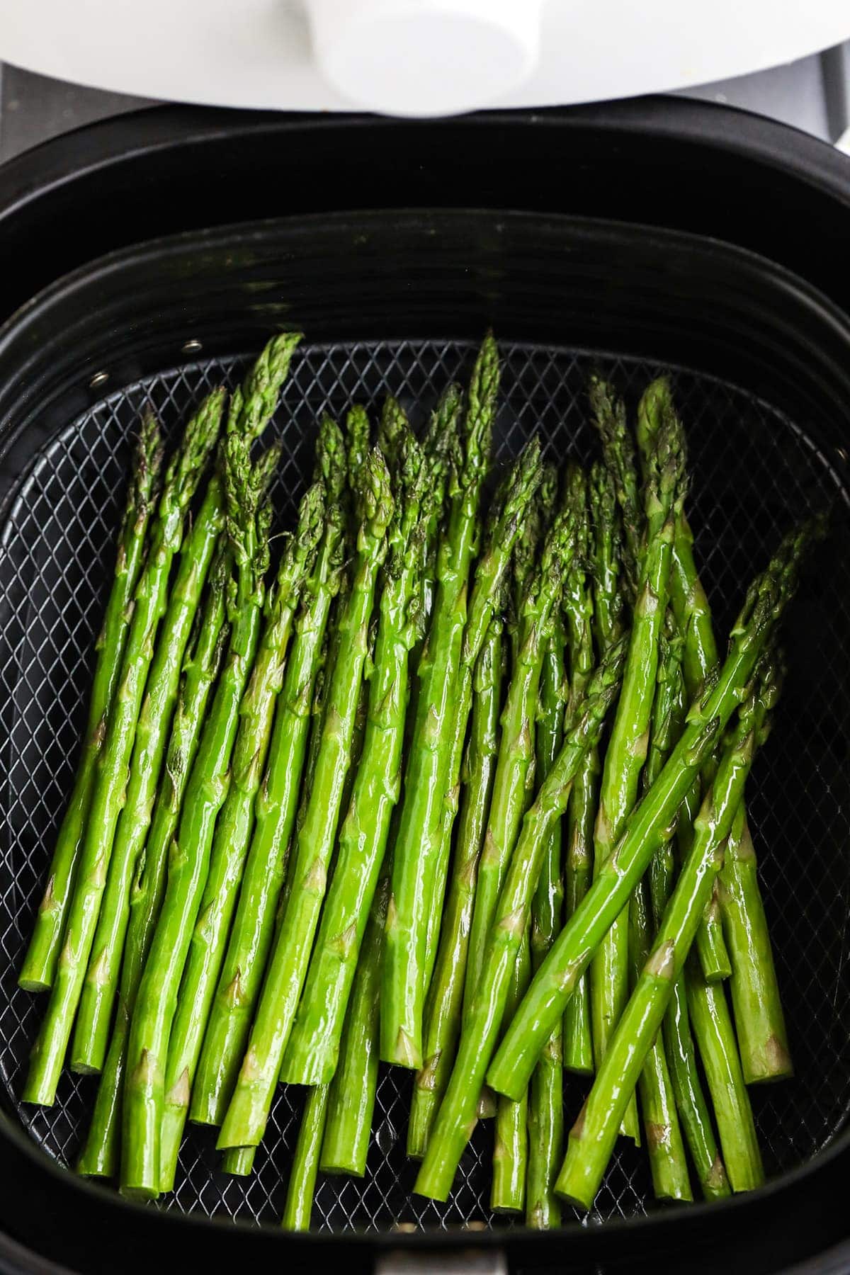 air fryer asparagus in air fryer basket