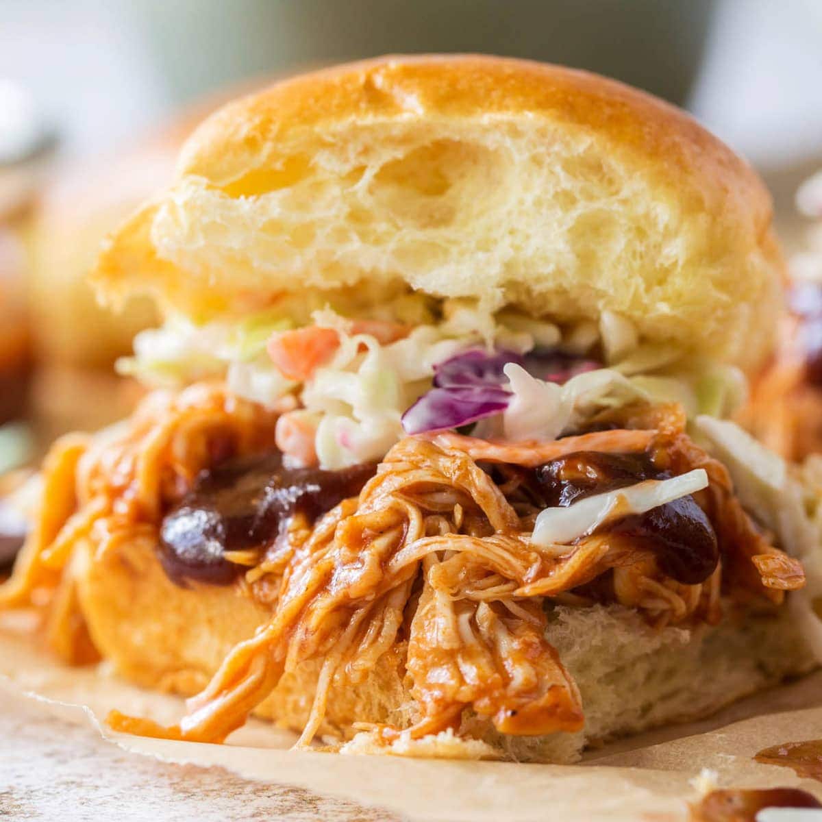 https://www.yellowblissroad.com/wp-content/uploads/2023/11/Slow-Cooker-BBQ-Chicken-Sliders-social.jpg