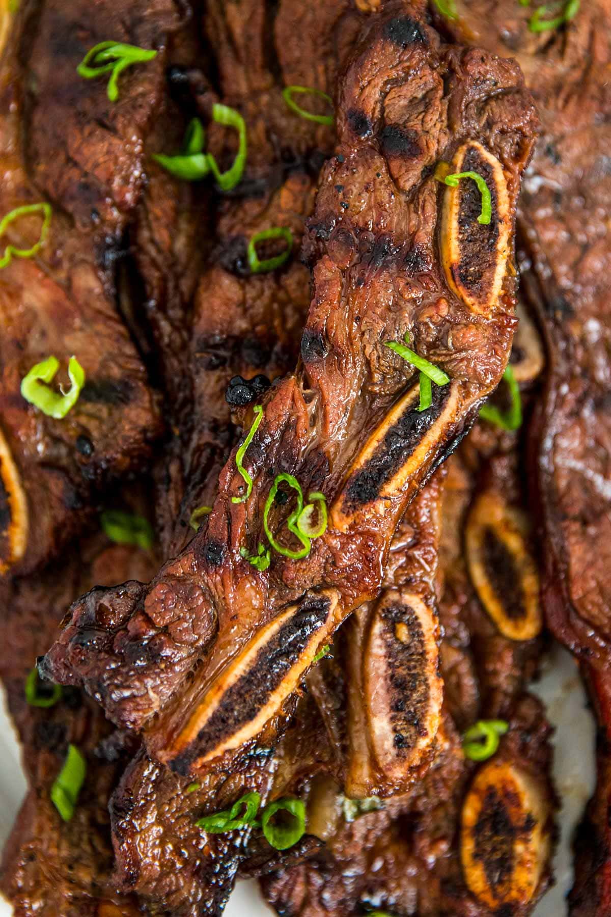 Close up of a platter of korean short ribs.
