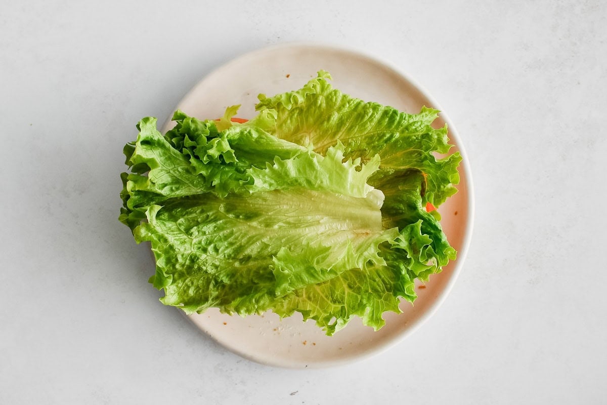 Lettuce leaves on a plate.