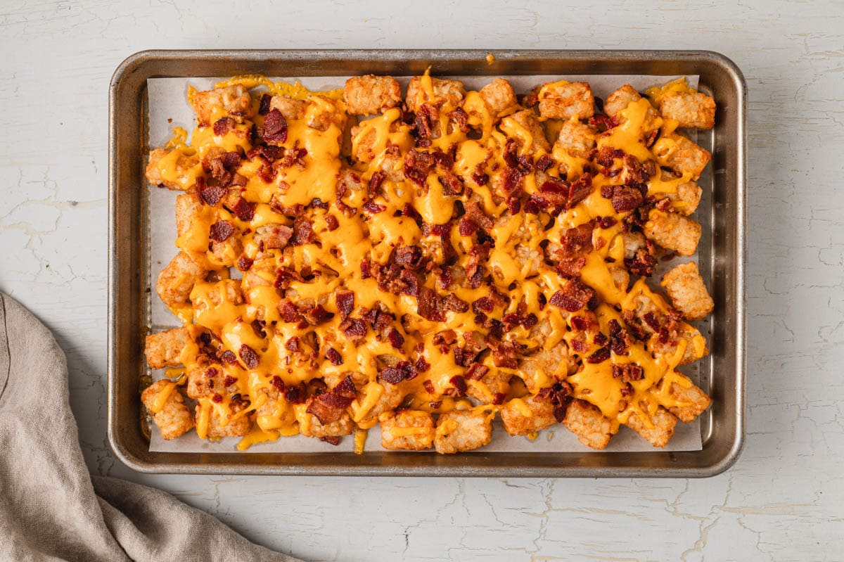 tater tots with shredded melted cheese and bacon.