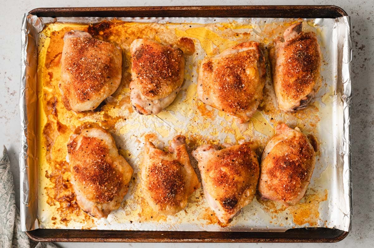 Baked chicken thighs on a sheet pan