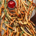 french fries with a dish of ketchup.