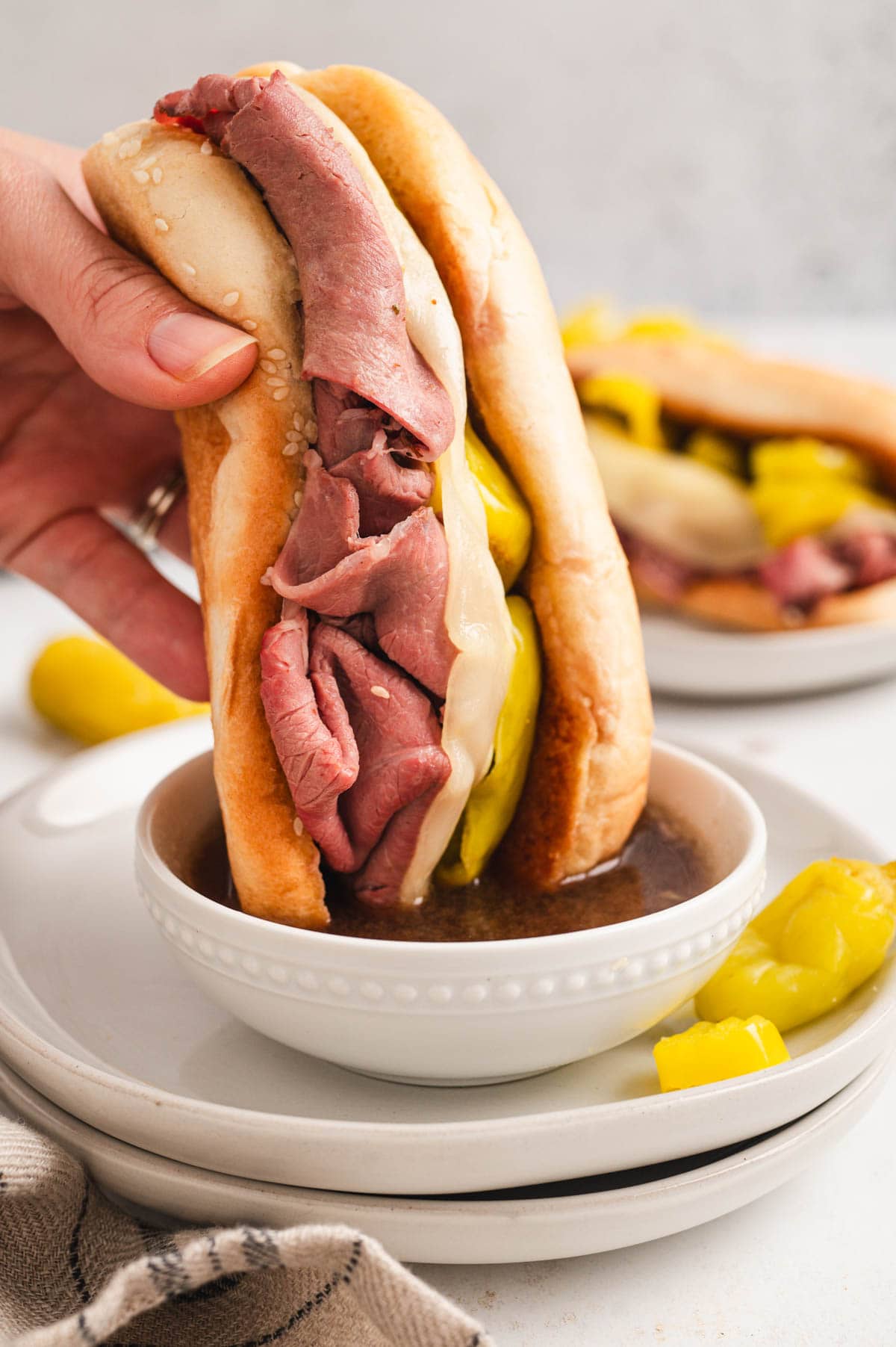 Italian beef sandwich dipped in au jus.