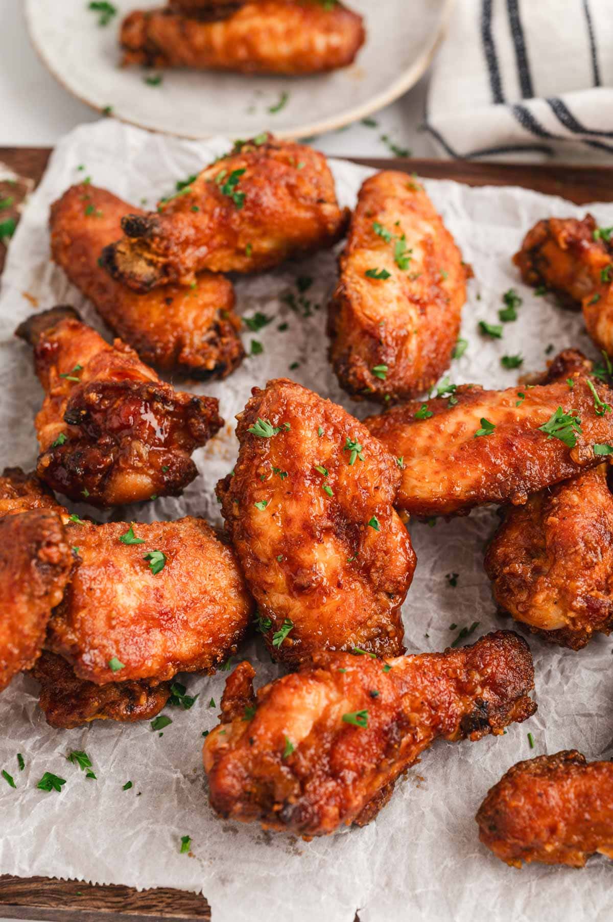 chicken wings on parchment paper.