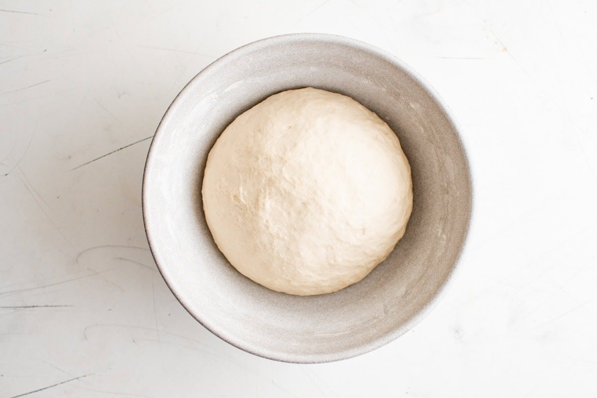 ball of dough in a large bowl.