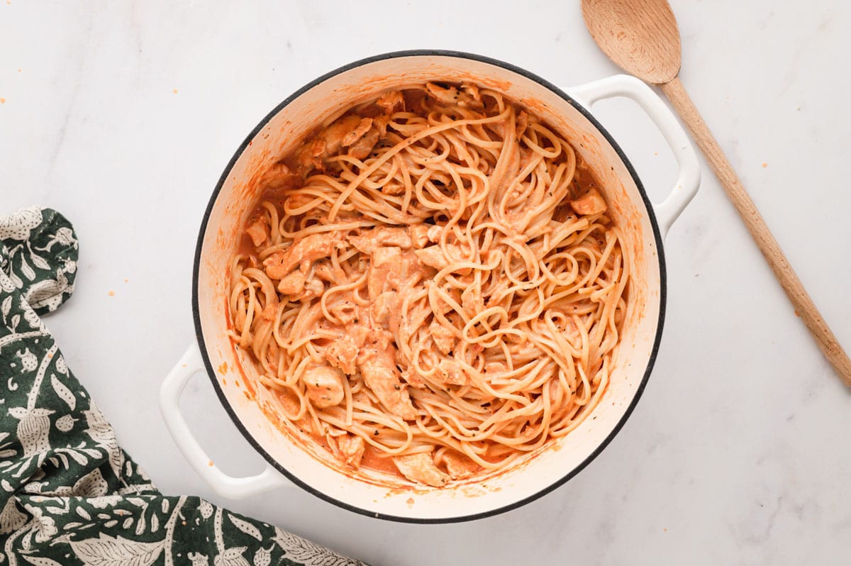 Linguine with chicken in a tomato cream sauce.