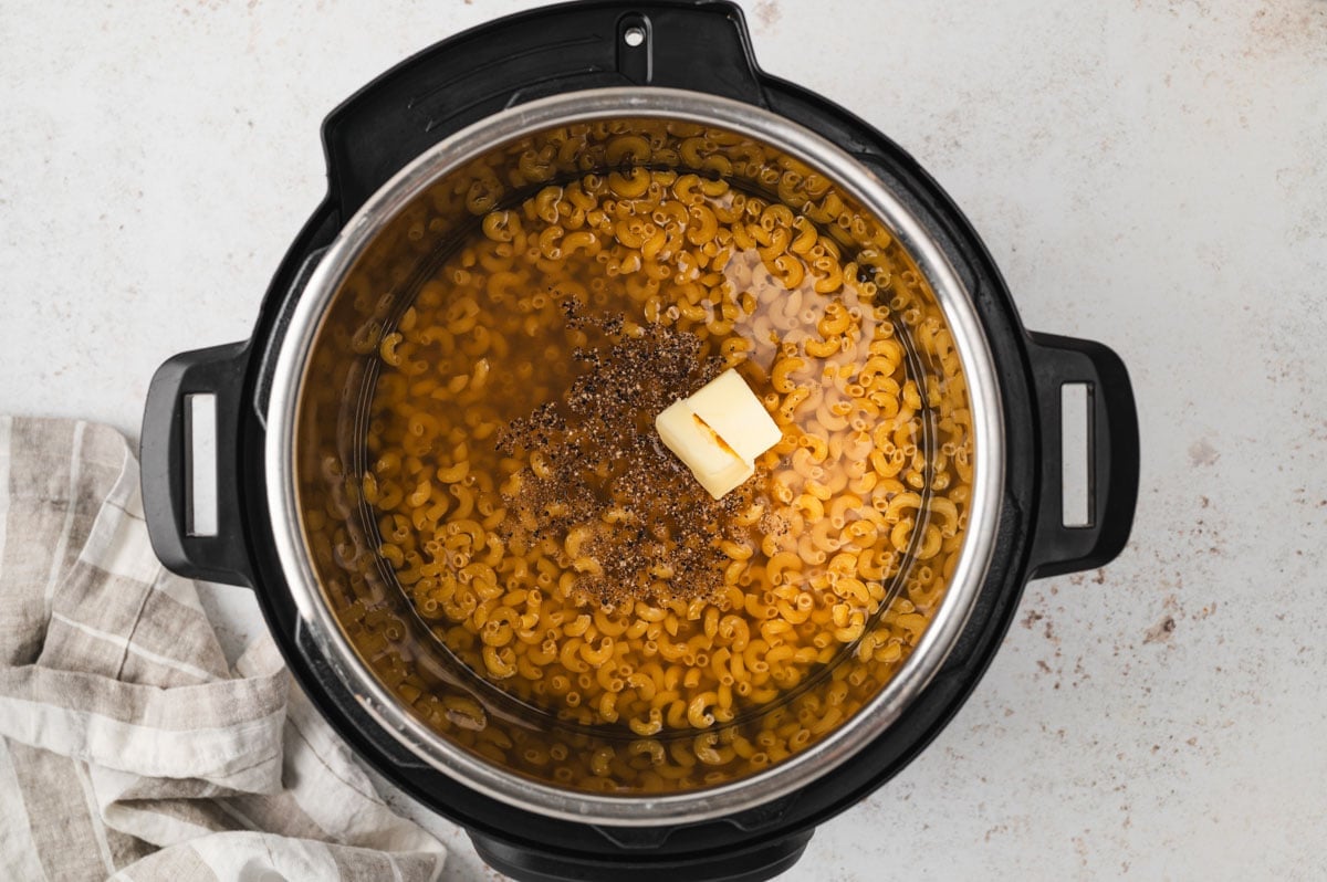 uncooked macaroni in an instant pot.