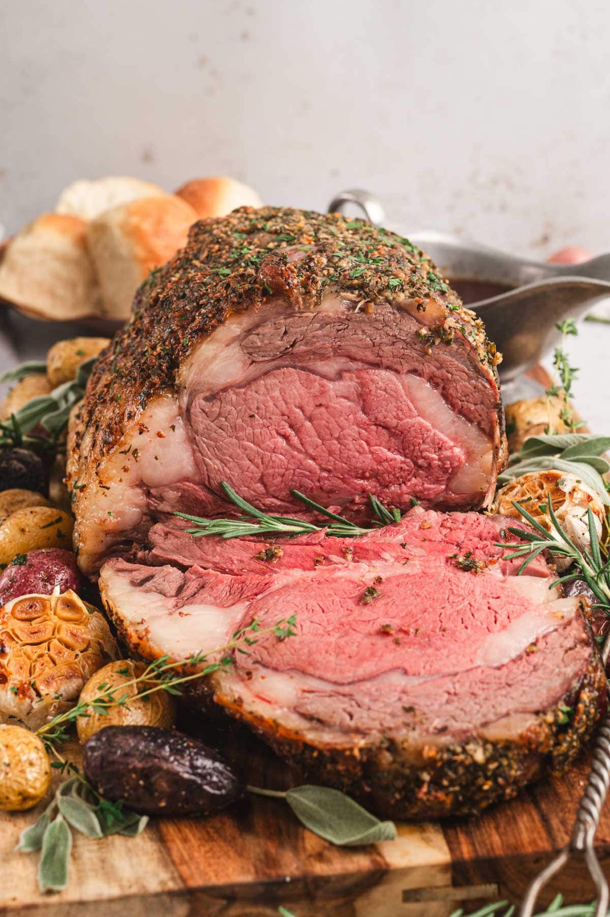 prime rib sliced on a cutting board.