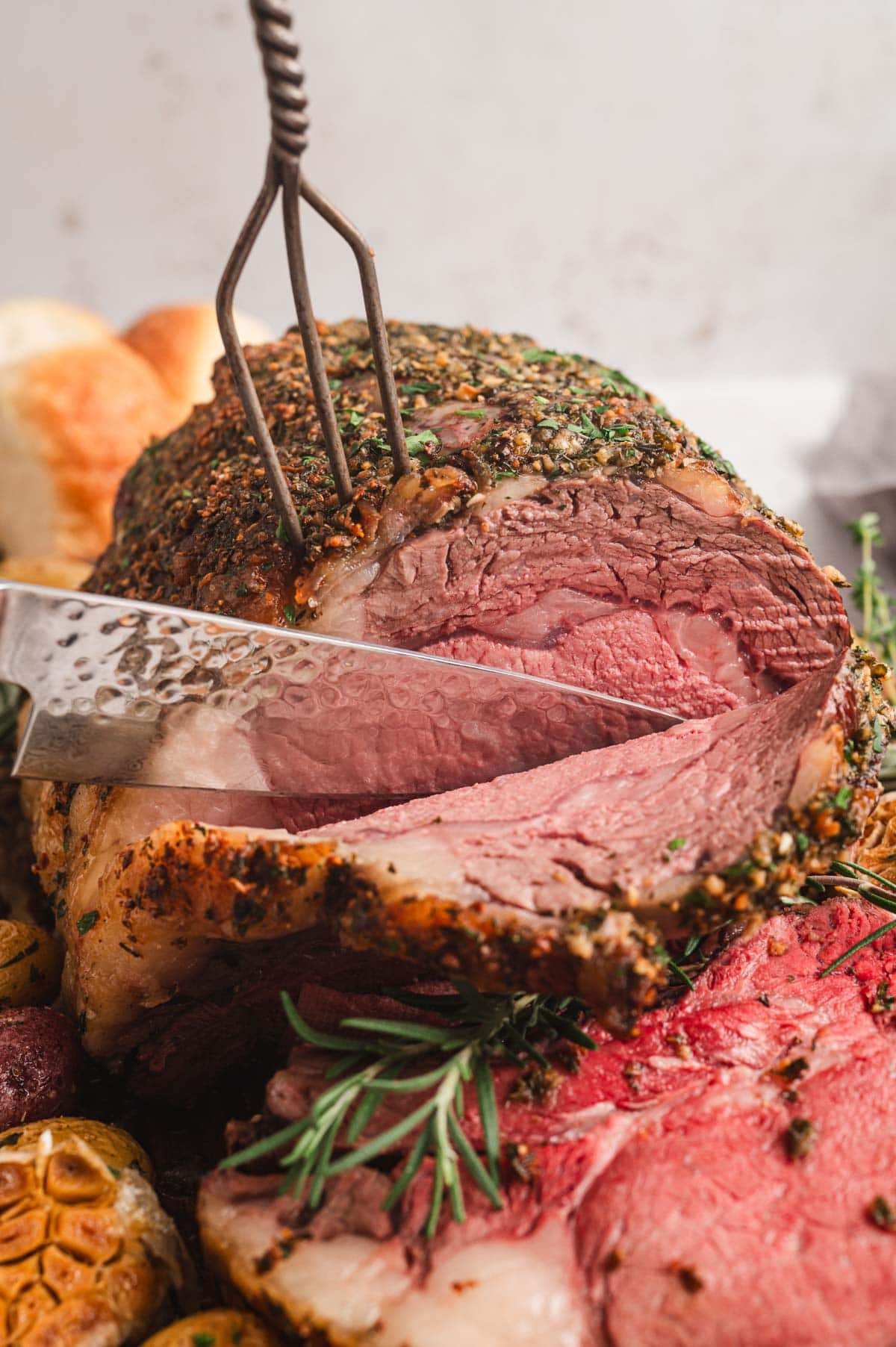 knife slicing prime rib.