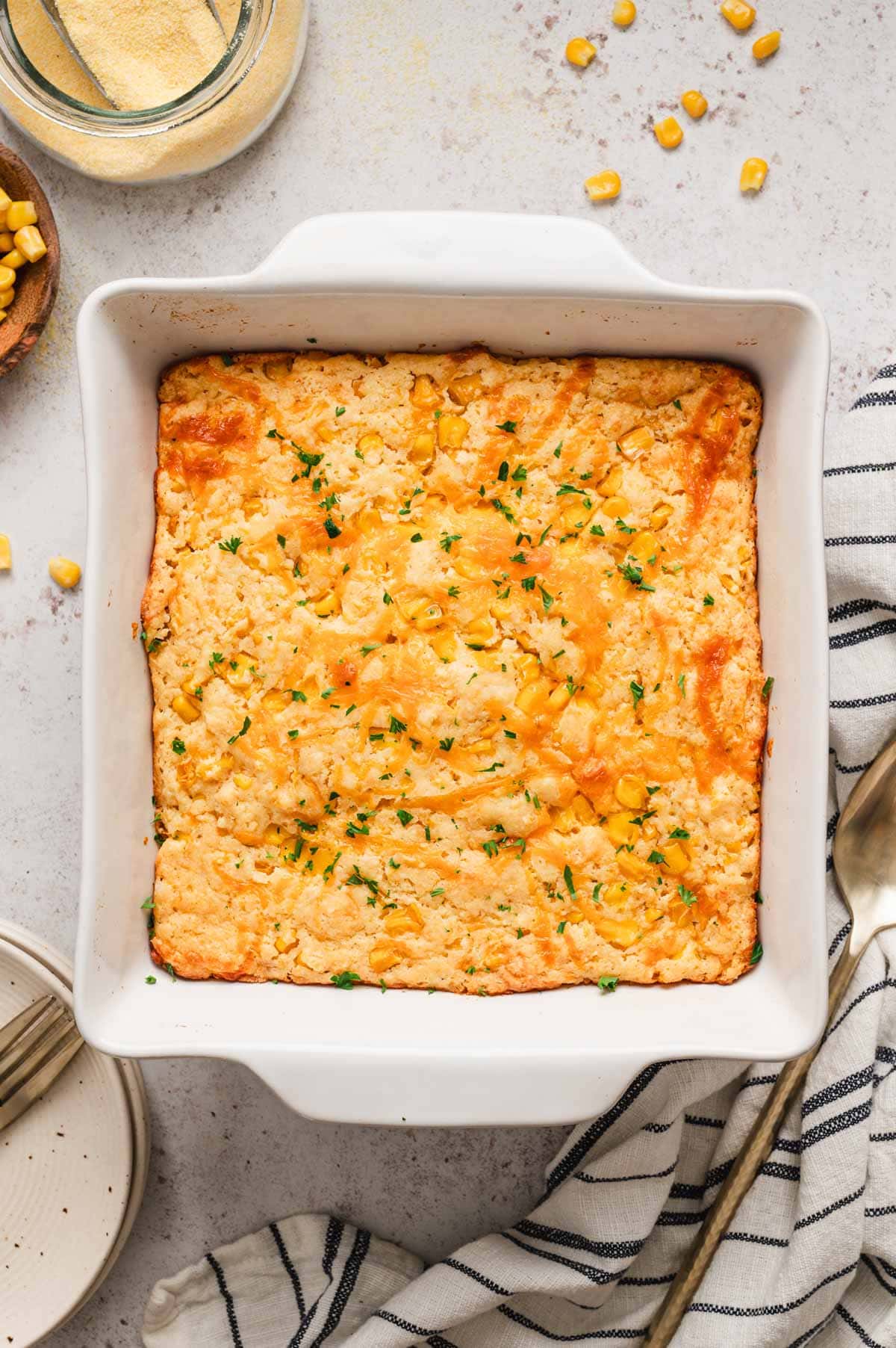 White baking dish of cornbread casserole