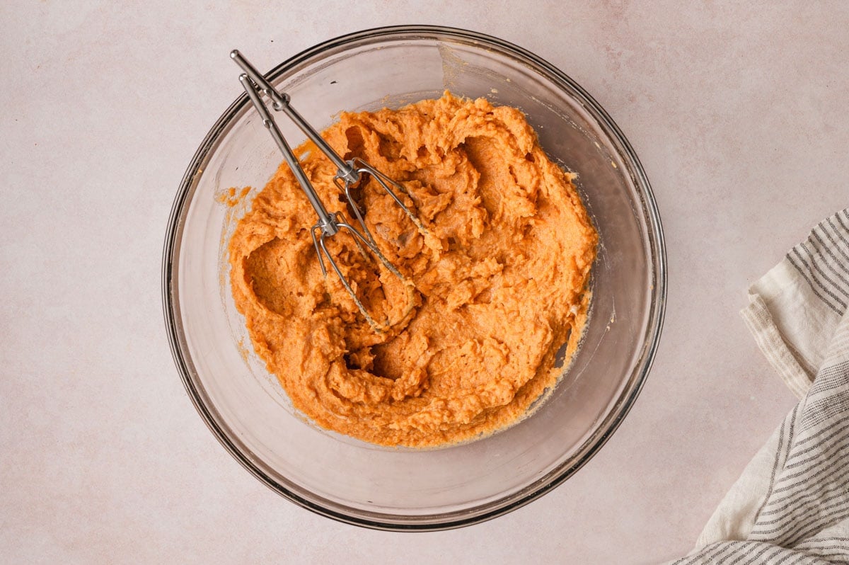 Sweet potato and cream cheese mixture in a glass bowl.