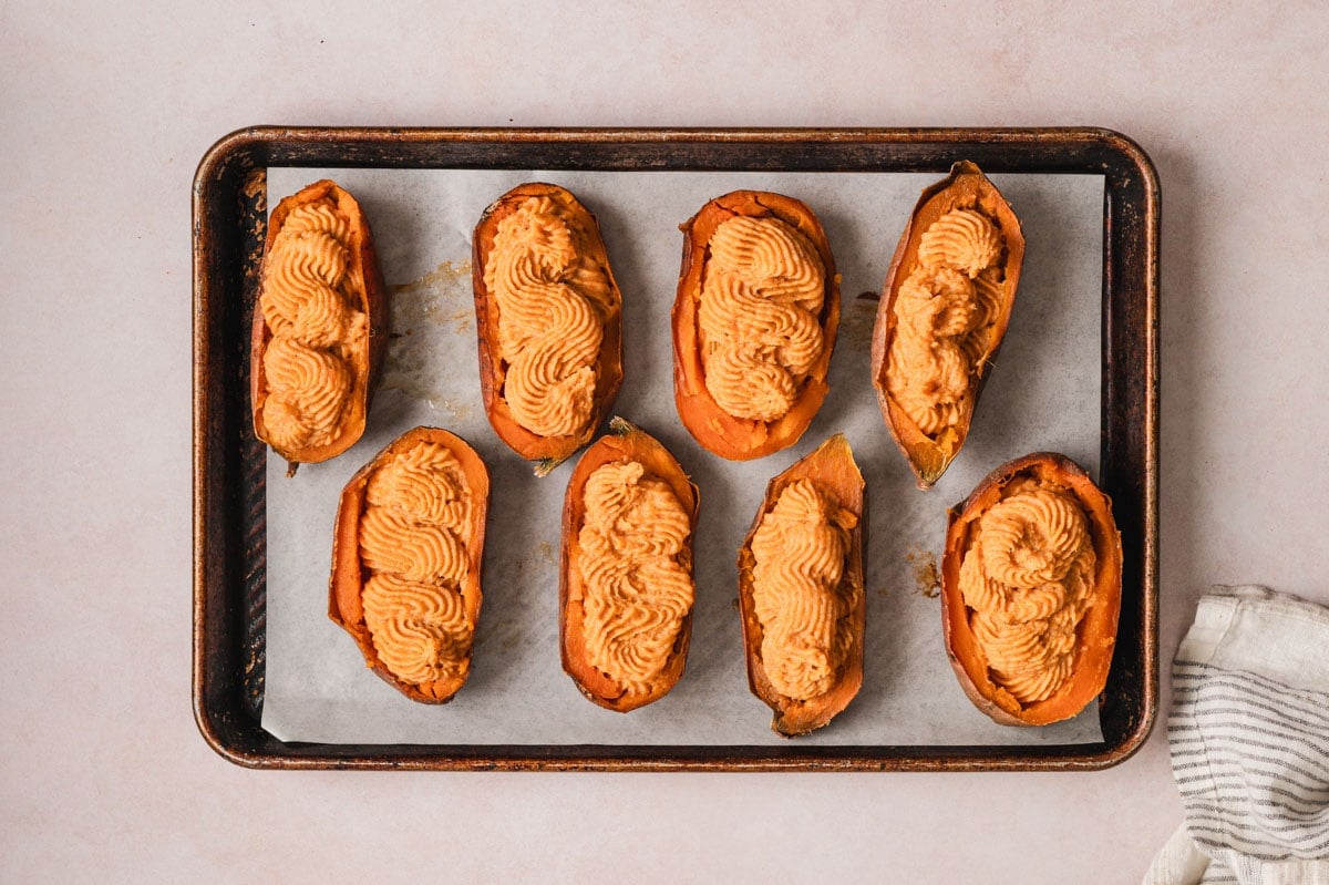 Halved sweet potatoes with cream cheese and sweet potato filling