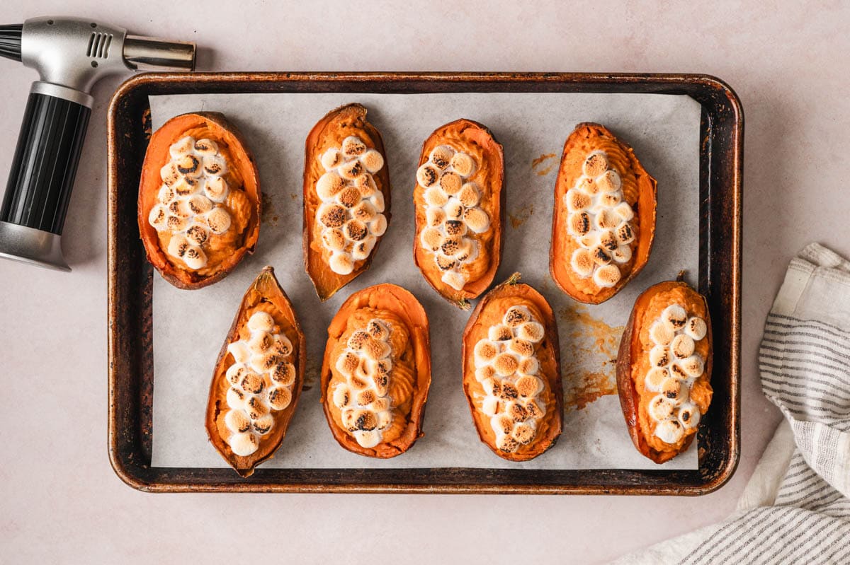 Twice baked sweet potatoes on a sheet pan.