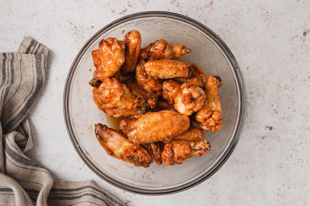 baked chicken wings in a glass bowl