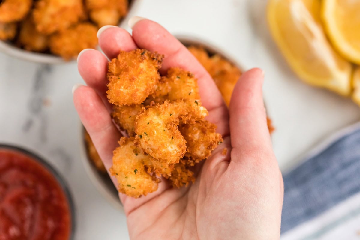 popcorn shrimp in a hand