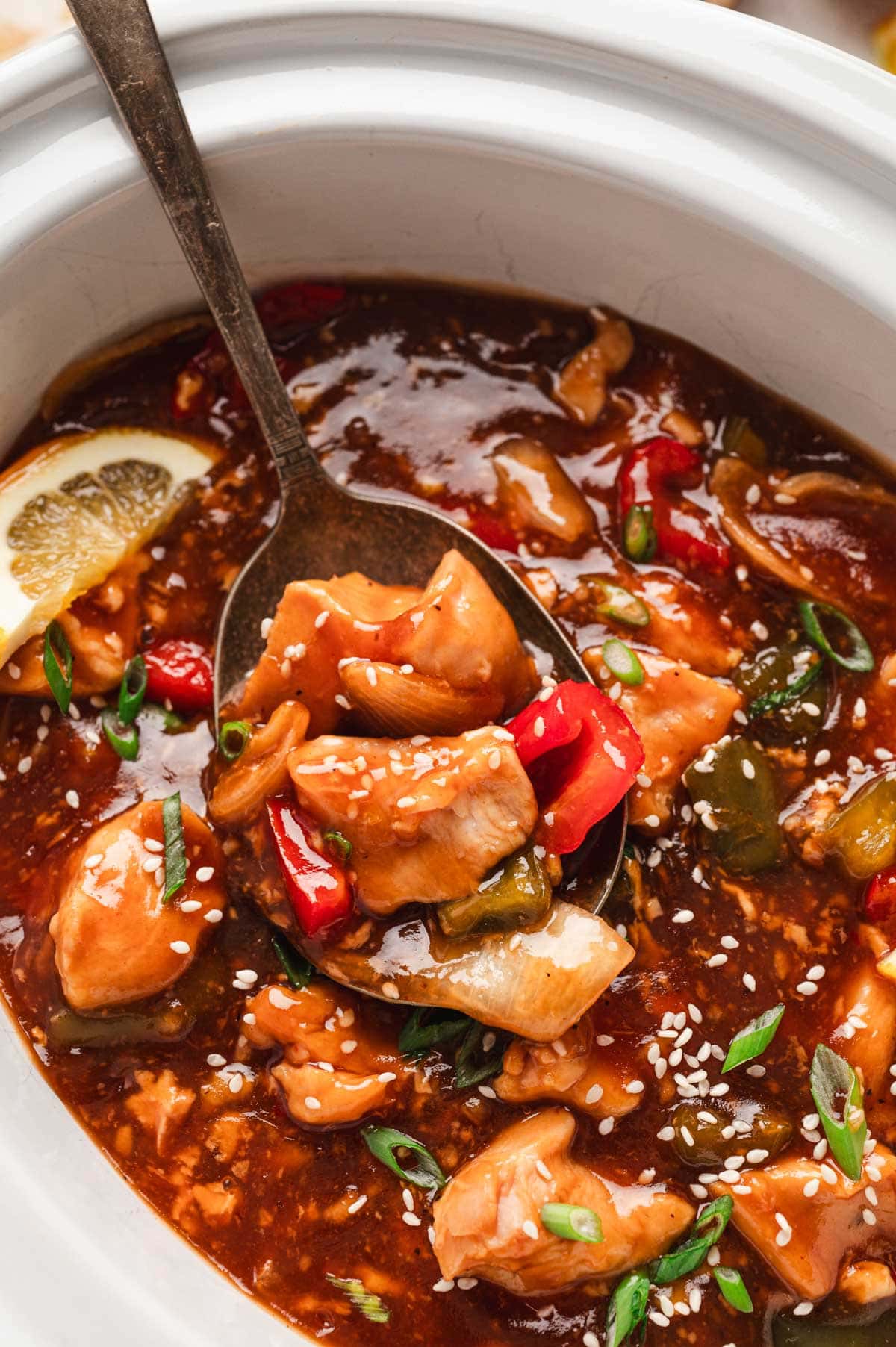 Close up of orange chicken and vegetables.